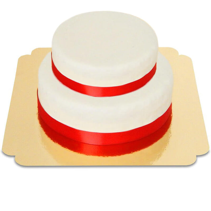 Two-tier white cake with cake ribbon