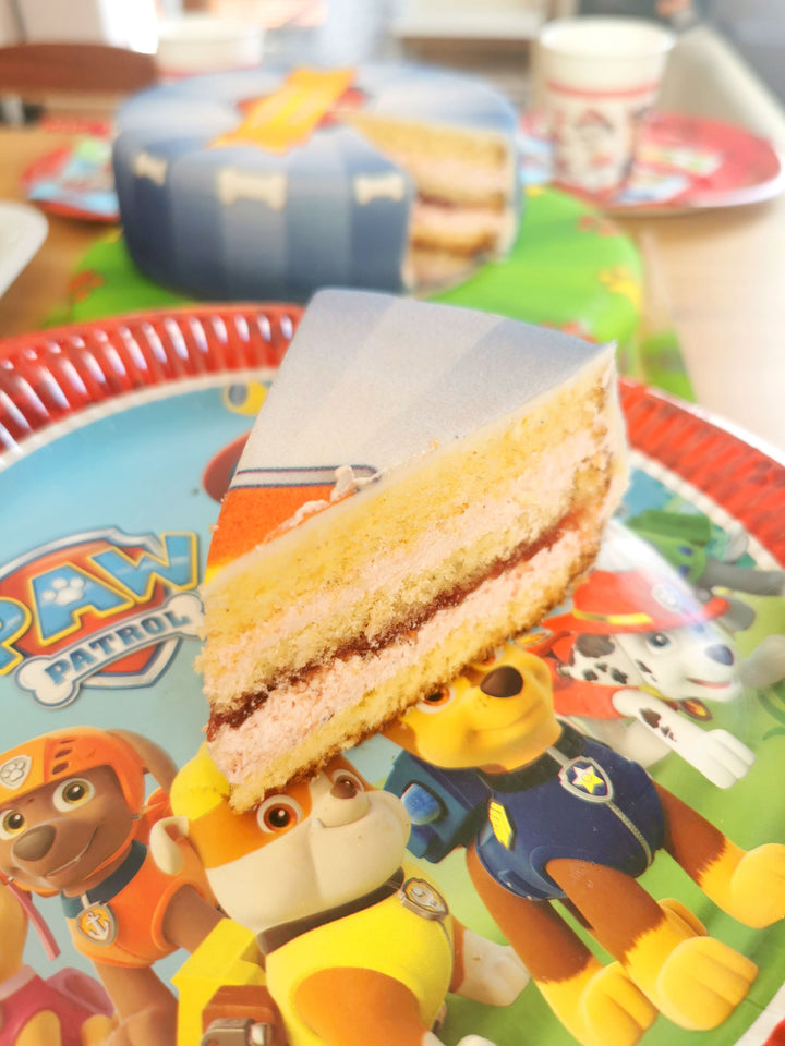 Chase and Marshall from PAW Patrol® on a two-tier dog hero cake