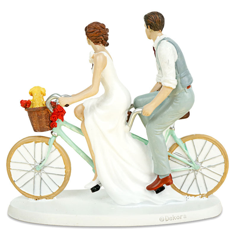 Cake topper – bride and groom on a bicycle