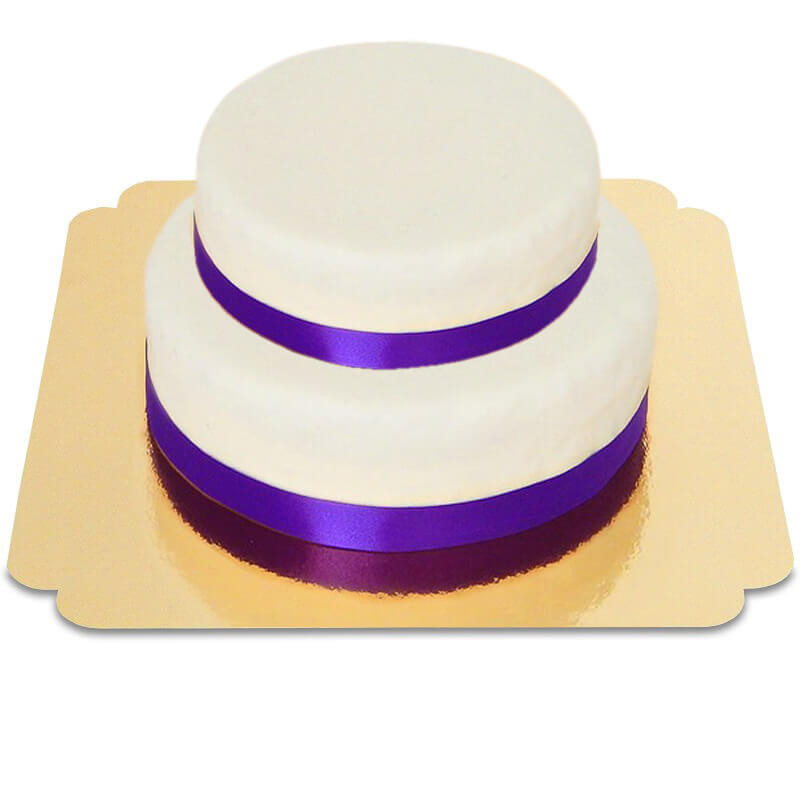 Two-tier white cake with cake ribbon