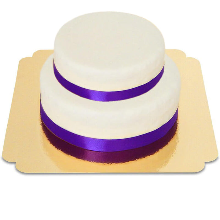 Two-tier white cake with cake ribbon