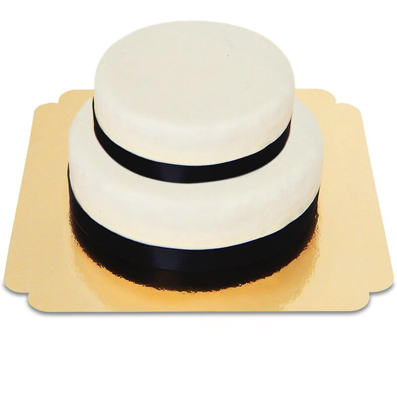 Two-tier white cake with cake ribbon