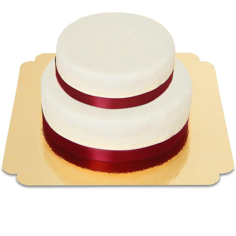 Two-tier white cake with cake ribbon