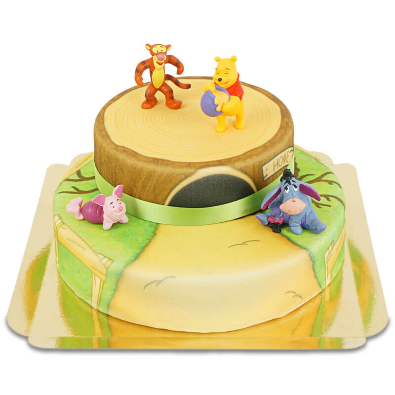 Winnie the Pooh® and Tigger on a two-tier Hundred Acre Wood cake