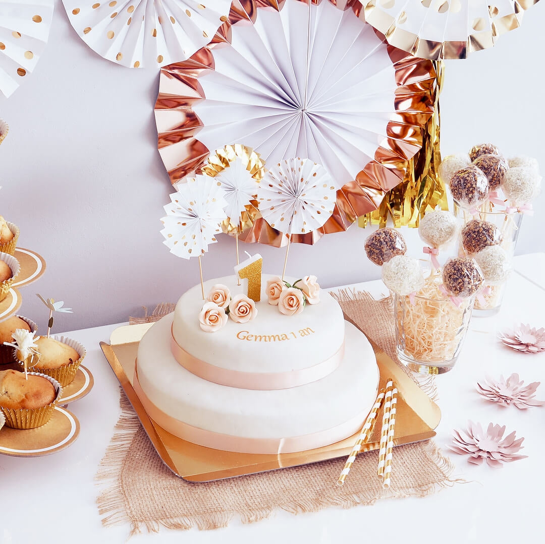 Two-tier white cake with cake ribbon